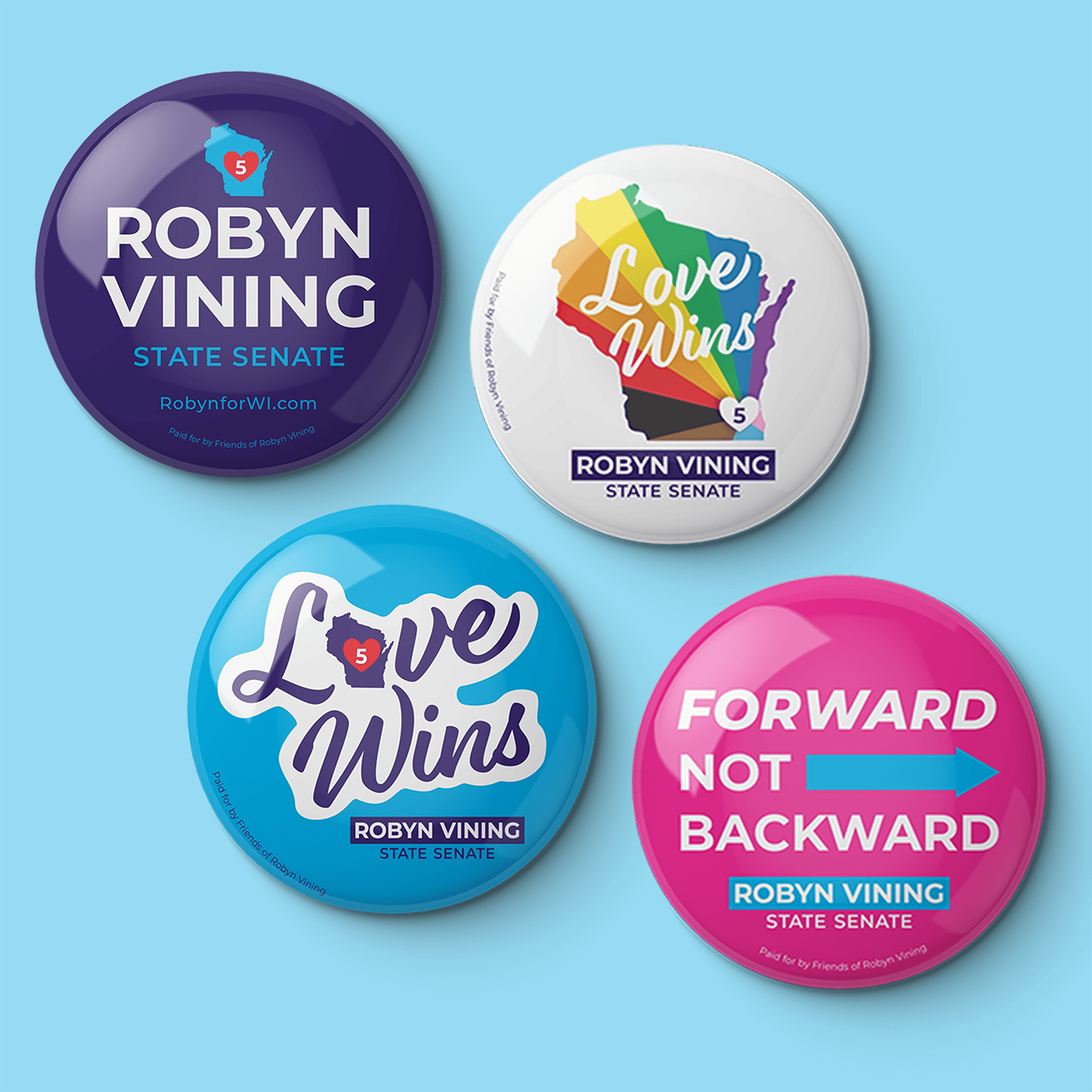 Four campaign buttons for Robyn Vining, state senate candidate, featuring slogans including Love Wins and Forward Not Backward with the number five and a map of Wisconsin.